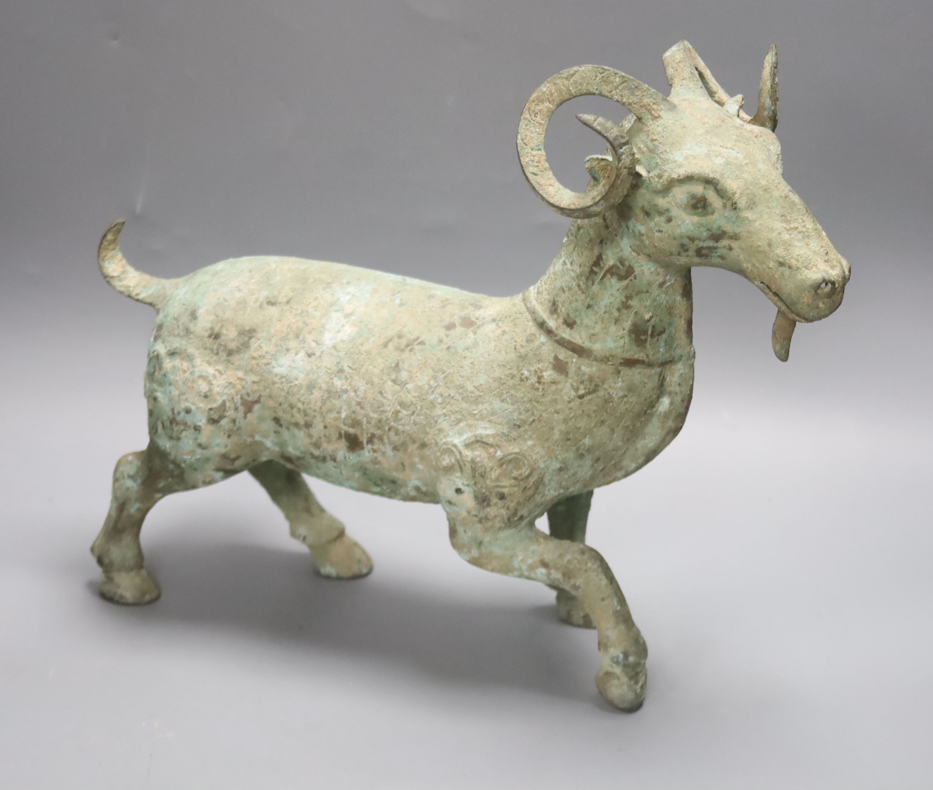 A large Chinese bronze ram, width 36cm height 30cm